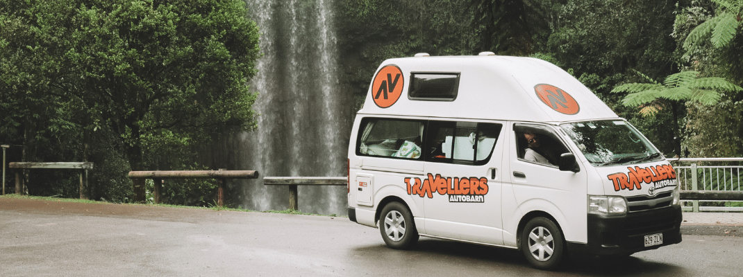 Campervan in front of Millaa Millaa Falls, Queensland