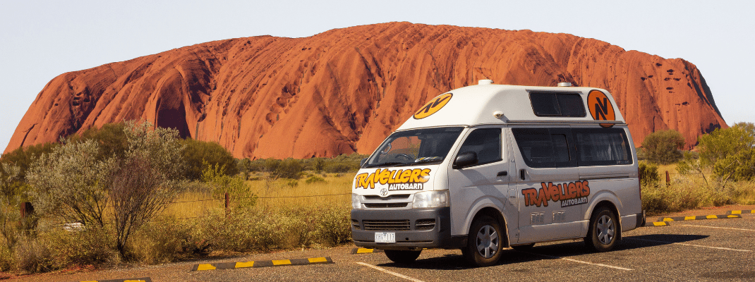 Campervan in front of Uluru, Northern Territory