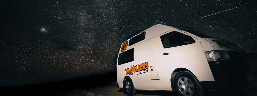Stargazing next to a campervan in South Australia